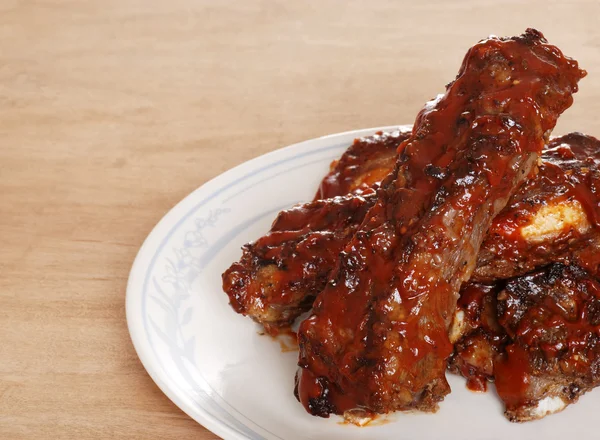Barbecue sauce covered beef spare ribs — Stock Photo, Image