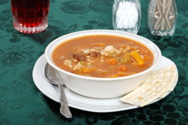 Beef barley soup with a drink clipart