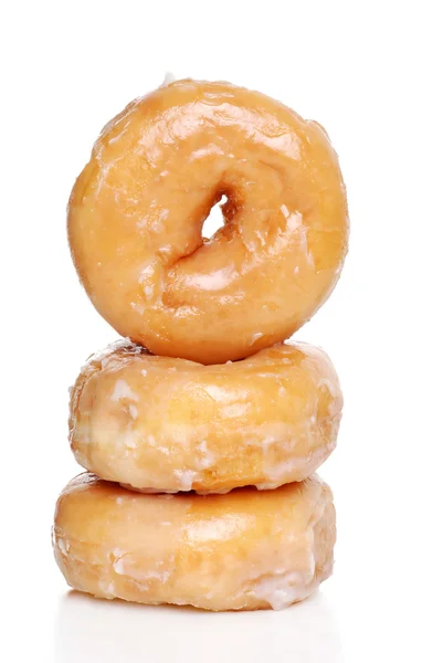 Drie geglazuurde donuts — Stockfoto