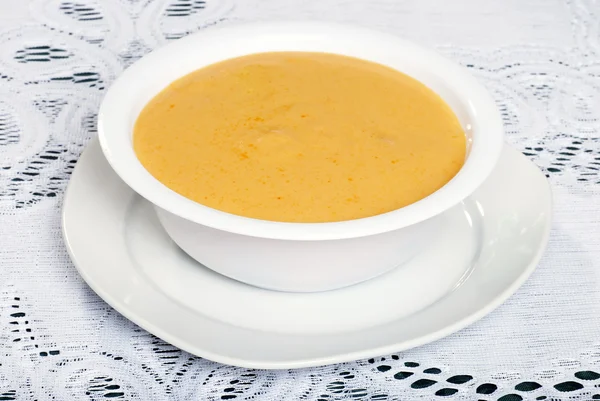 Bowl of cheddar cheese soup — Stock Photo, Image
