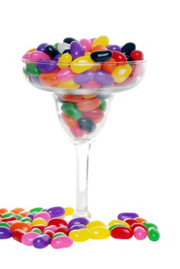 Colorful candy beans in margarita glass clipart