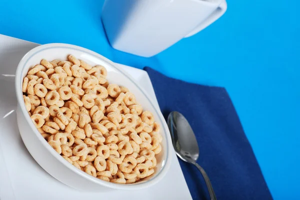 Bowl of round cereal — Stock Photo, Image