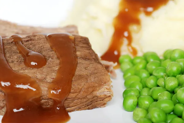 Closeup roast beef with gravy — Stock Photo, Image