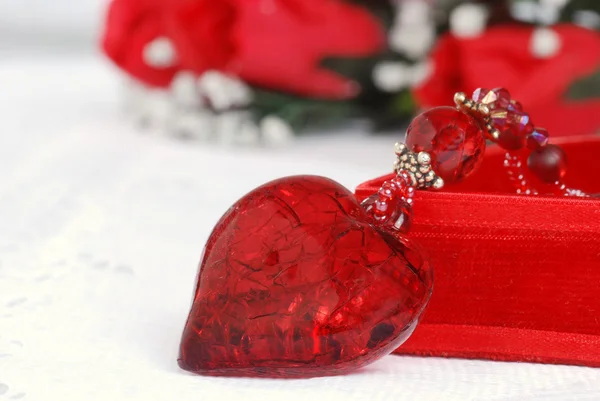 Macro red heart necklace — Stock Photo, Image