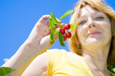 Woman with cherries clipart