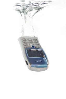 A cellphone falling into clear water clipart