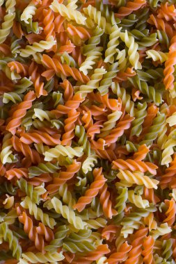 Texture of 3 colored pasta clipart