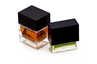 2 square bottles of perfume isolated on clipart