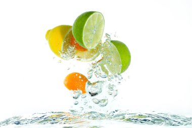 Citrus fruit jumping out of the water clipart