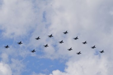 14 F-16 fighter jets in formation clipart