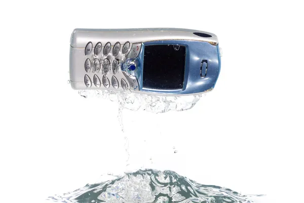 A cellphone jumping out of the water — Stock Photo, Image