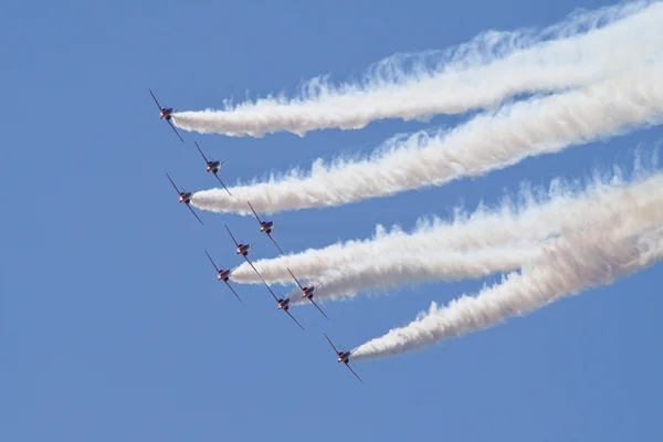 The red arrows with white smoke — Stock Photo, Image