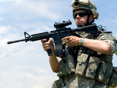 Soldier aiming his rifle clipart