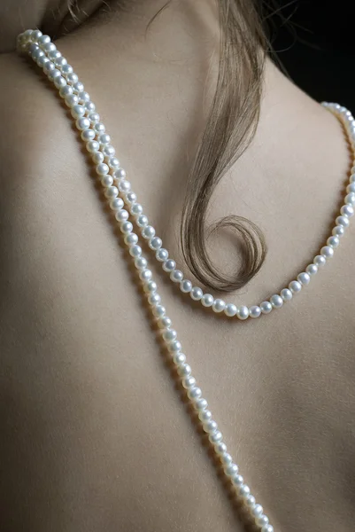 Woman with pearls — Stock Photo, Image