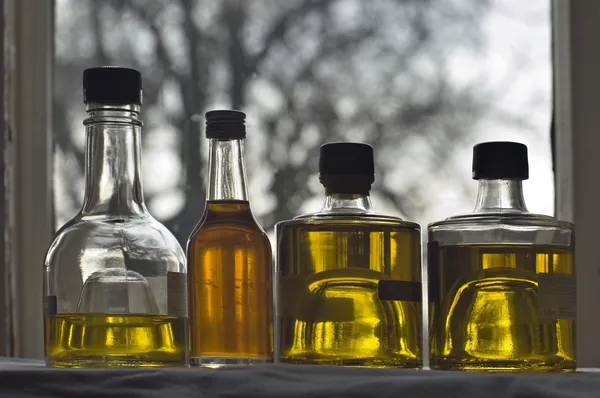 Vier Flasche Olivenöl — Stockfoto