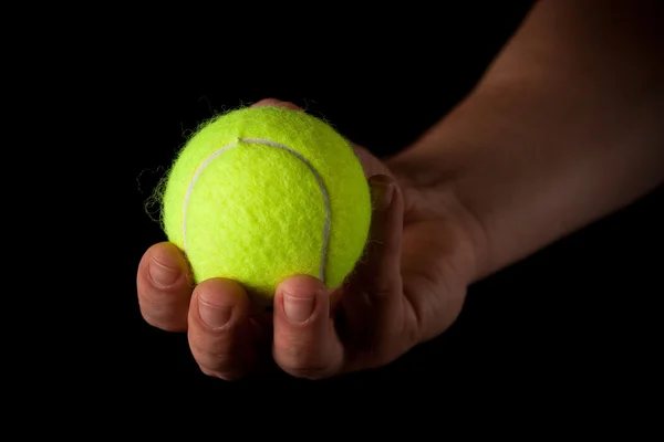 Tenere la palla da tennis — Foto Stock