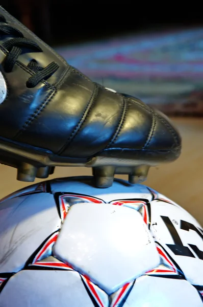 Ball and a football boot — Stock Photo, Image
