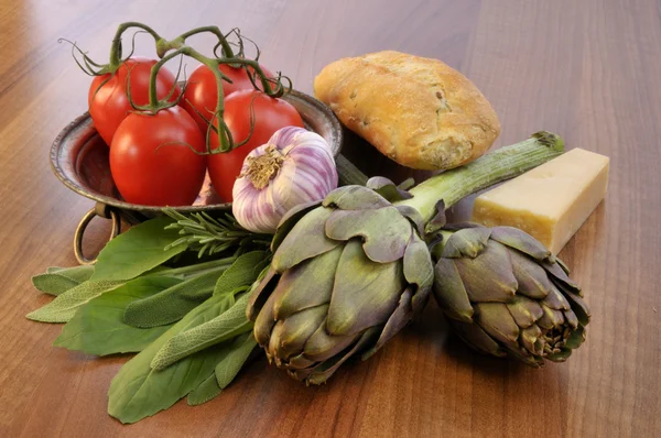 Artichoke and mediterran ingredients — Stock Photo, Image