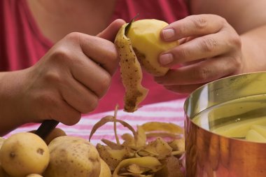 Peeling potatoes clipart