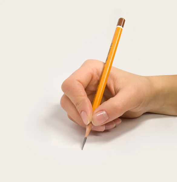Ręka z ołówkiem — Zdjęcie stockowe