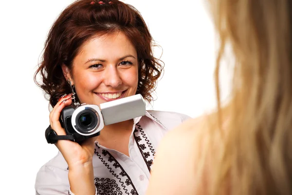 Mulher com uma câmera de vídeo — Fotografia de Stock