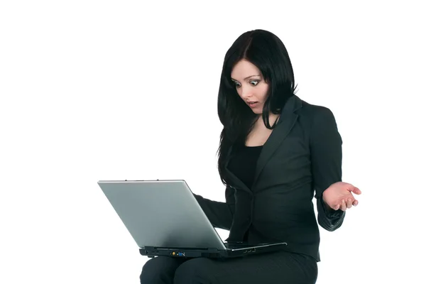 Young businesswoman with laptop on white — Stock Photo, Image