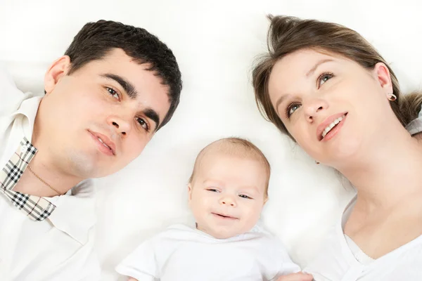 Familia feliz - madre, padre y bebé — Foto de Stock