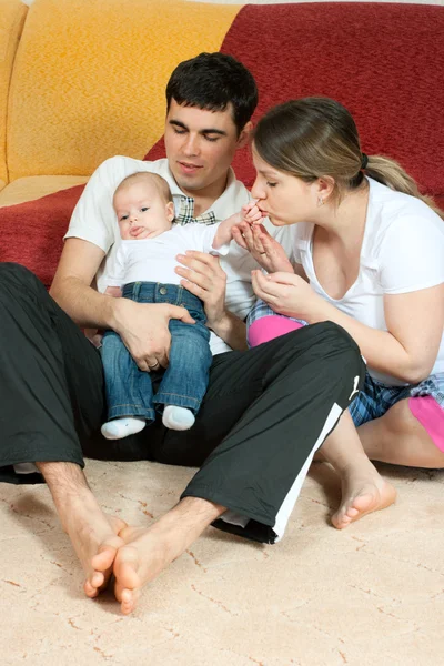 Happy family - mother, father and baby — Stock Photo, Image