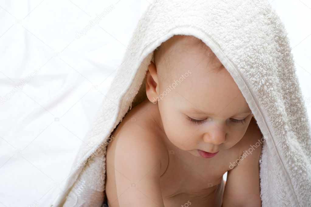 Baby portrait with towel