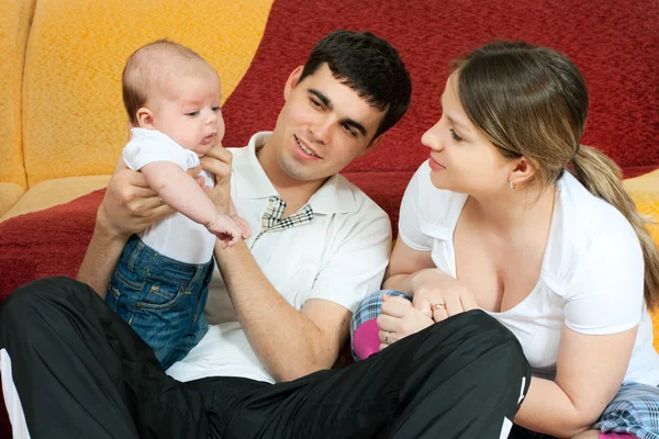 Happy family - mother, father and baby — Stock Photo, Image