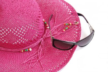 Beach hat and glasses. clipart