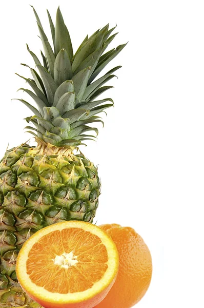 Juicy oranges and pineapple. — Stock Photo, Image
