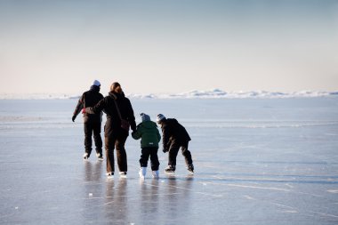 Family ice skating clipart