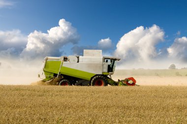 Combine at harvest time clipart