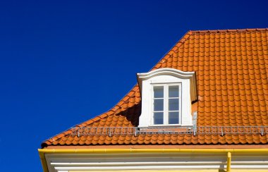 Tiled roof and one window clipart