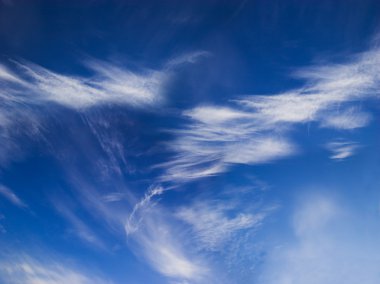 Deep blue sky with white clouds clipart