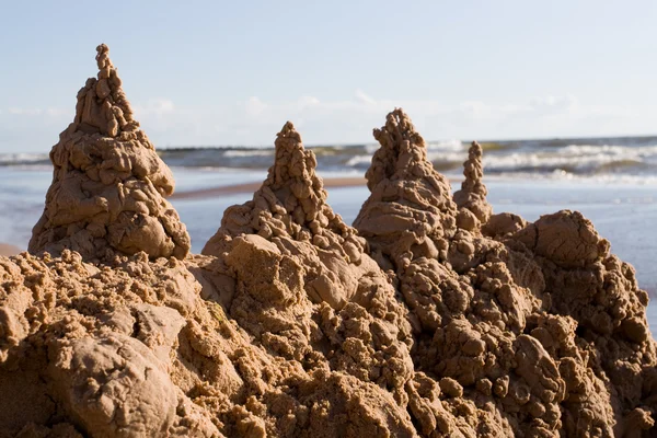 Sand castle at the beach — Stock Photo, Image