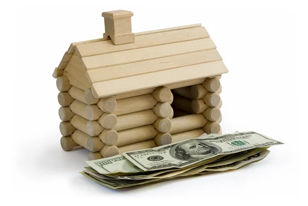 stock image Log building model and money