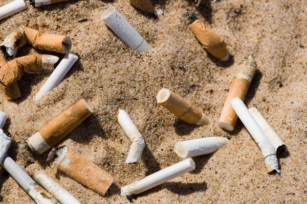 stock image Cigarette butt in sand