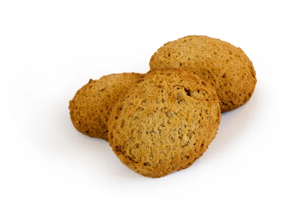 Three oatmeal cookies with raisins — Stock Photo, Image