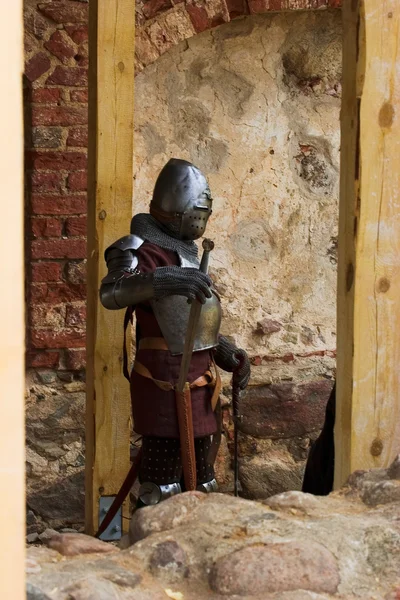 stock image Armoured knight with swords
