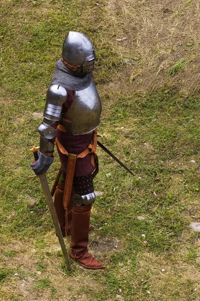 Armoured knight with swords