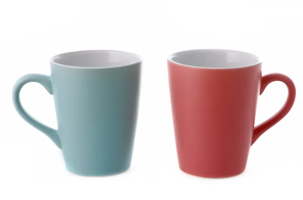 Zwei Tassen auf weißem Hintergrund — Stockfoto