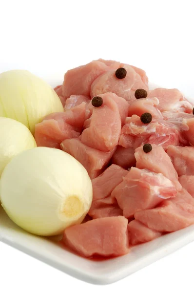 Raw pork meat and onion — Stock Photo, Image