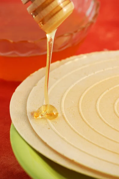 Flowing honey and waffle — Stock Photo, Image