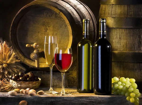 Still-life with wine and barrels Royalty Free Stock Images