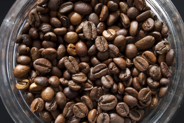 Coffee beans and jar — Stok fotoğraf