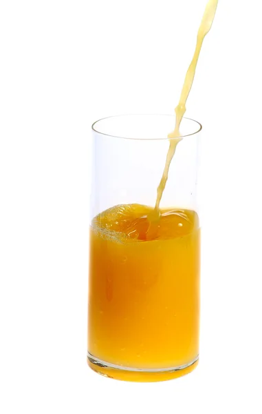 Orangensaft in Strömen — Stockfoto