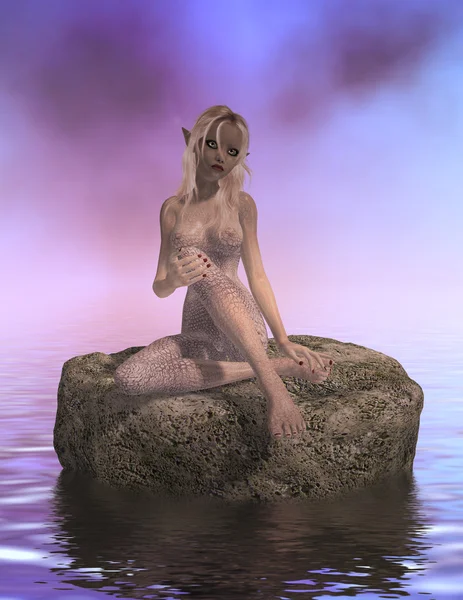 坐在一块岩石上的海妖 — 图库照片