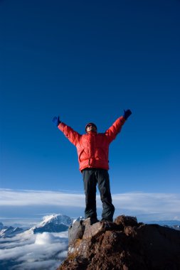 Rock-climber on background mountain clipart